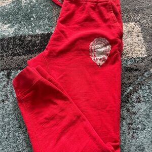 Versace Red Joggers with Silver Lion Emblem